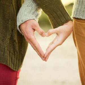 Shows a couple holding hands to symbolise caring for someone. Get this gift voucher/ e-coupon for someone you care about to support them.